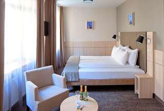 Отель Wellton Centrum Hotel & SPA Рига Улучшенный двухместный номер с 1 кроватью или 2 отдельными кроватями-3