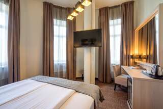 Отель Wellton Centrum Hotel & SPA Рига Улучшенный двухместный номер с 1 кроватью или 2 отдельными кроватями-5